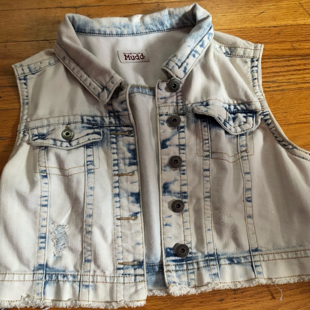 Sleeveless blue jean jacket